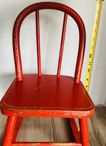 Sedia dondolo rossa per - a,