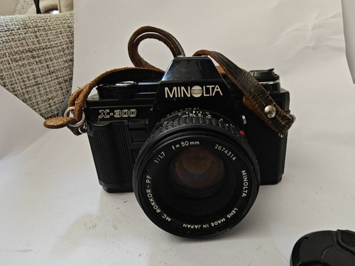 Minolta 300 con objetivo - minolta,