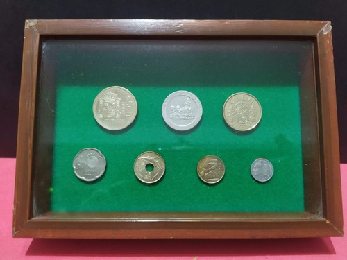 Monete pesetas incorniciate