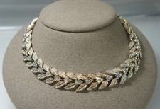 Collana girocollo CORO vintage tono oro foglia incernierata aurora boreale pietra cristallo