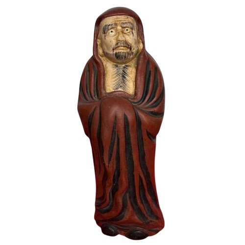 Daruma antica statua