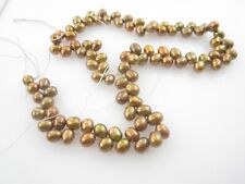 1filo di perle piccoli ovali foro traverso color dorato/bronzo cangiante