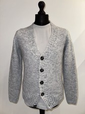 Cardigan in lana con rotture