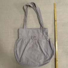 Borsa Subdued con fiocco a