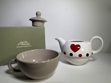 Teiera con tazza incorporata