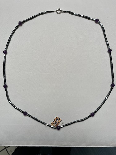 Collana lunga chiara con - lunga,