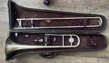 Trombone vintage H.N. White King cristallo argento testa di leone custodia originale