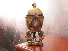 Uovo in porcellana bronzo con