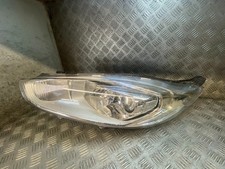 Faro proiettore anteriore lato