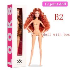 Bambola capelli ondulati rossi
