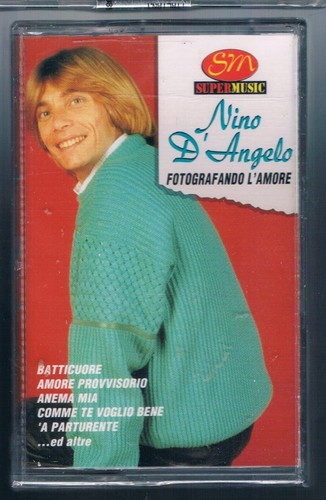 Nino angelo fotografando - nino,