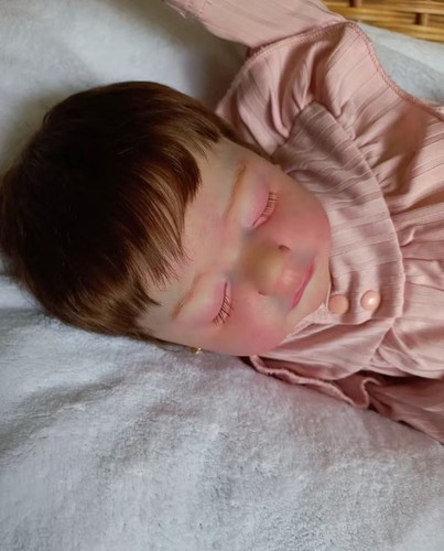 Bambola neonato addormentato