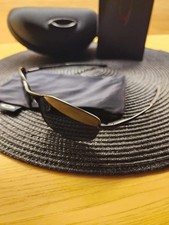 Occhiali da sole uomo Oakley Whisker ovali montatura in metallo nero lenti polarizzate Prizm!