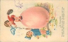 Easter playuing on giant egg 