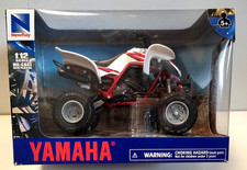 NEW RAY 1:12 DIE CAST ATV QUAD YAMAHA RAPTOR  660R BIANCO E ROSSO  ART 57503