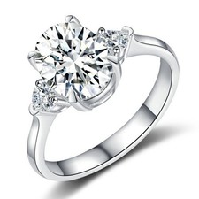 Anello a tre pietre con