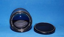 Soligor C/D 200 mm f 3.5 innesto Minolta MD, tappi