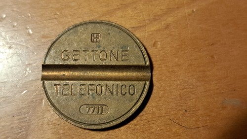 Gettone telefonico 7711 - gettone,