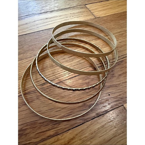 Set bracciali tono oro
