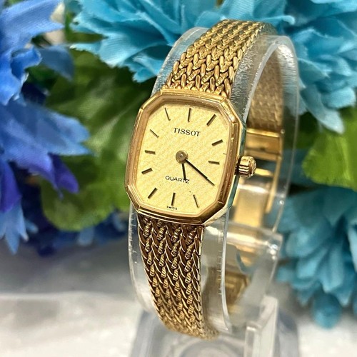 Tissot quartz gold dial - quartz, women