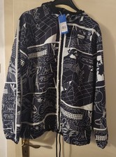 Adidas Giacca a Vento Fumetto Bianco e Nero GN3333 Multicolore Wb