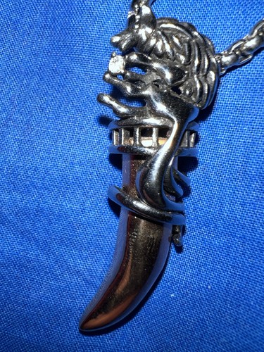 Dente lupo con - di,