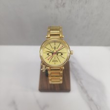 Orologio Vivienne Westwood Triple Gold Madre Orb Charm VV006KGD con etichette, senza scatola.