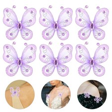  24 farfalle in organza trasparente: cornice in filo metallico con strass -