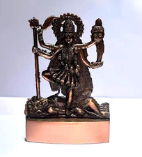 Statua idolo marrone antico