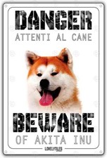 Cartello attenti al cane Akita