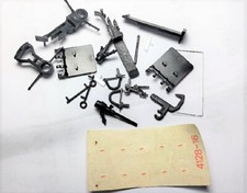 BUSTINA DI ACCESSORI IN SCALA H0 PER LOCOMOTIVA TRENO 4128-16 ROCO 91993 XX