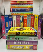 Lotto 48 vhs cartoni animati Disney e altri, cassette boxe e aereonautica.