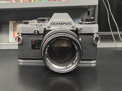 Olympus om10 corpo obiettivo - e,