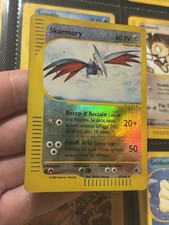 63/165 Rara Reverse Holo