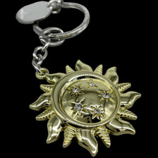 Portachiavi femminile da borsa colore argento oro anello e ciondolo sole firmato