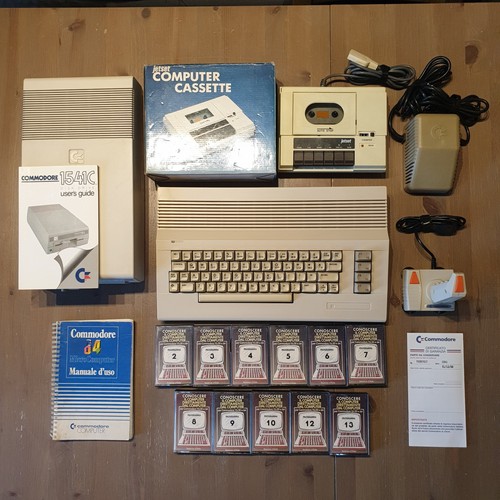 Commodore c64c con - sigillo, +