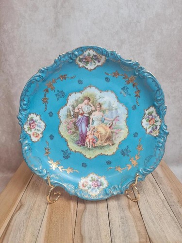 Plat mural ancien porcelaine