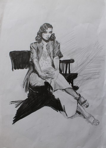 Studio una donna seduta con - di,