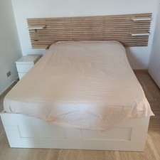 letto matrimoniale con quattro cassetti e testata in legno usato
