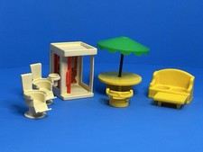 Cabina telefonica sedie divano