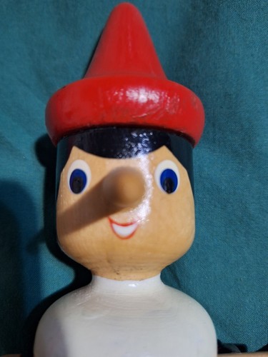 Salvadanaio pinocchio legno - in,