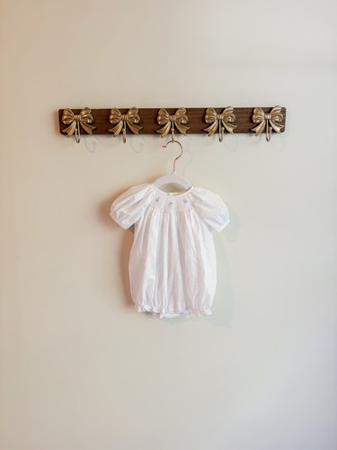 Pagliaccetto neonato bianco
