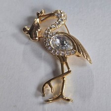 Set spilla cicogna e bambino