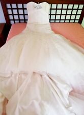 abito da sposa a sirena senza spalline con tulle e ricami