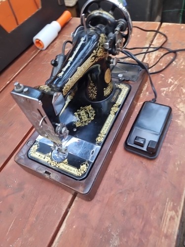 Singer sewing machine model - machine,