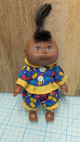 Mini bambola giocattolo