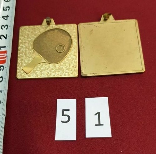 Medaglia metallo dorato - in,
