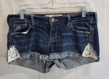 Pantaloncini donna Hollister Socal elasticizzati con polsini 5 blu denim inserto pizzo orlo sfilacciato