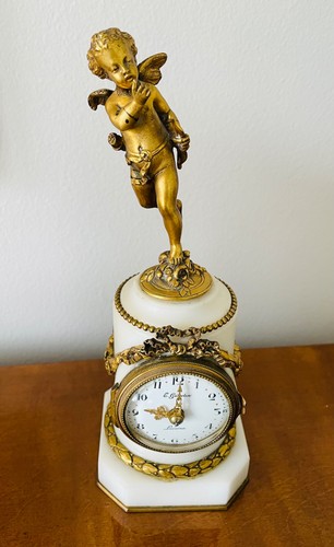 Orologio cherubino e - cherubino, (putti)