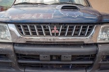 PARAURTI ANTERIORE COMPLETO PER MITSUBISHI L 200 2° Serie MR241037 (86>96)